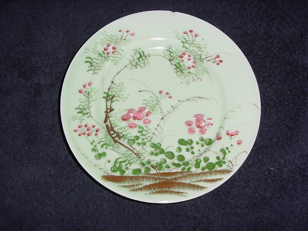 Japanese celadon
              plate with handpainting