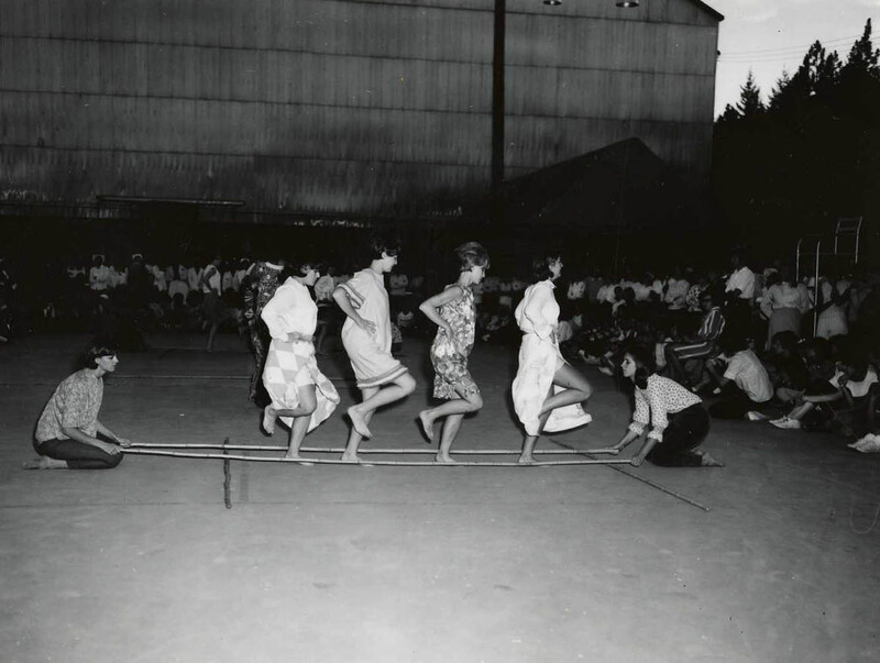 women dancing at Folk Dance Festival outside the Kibbie Dome