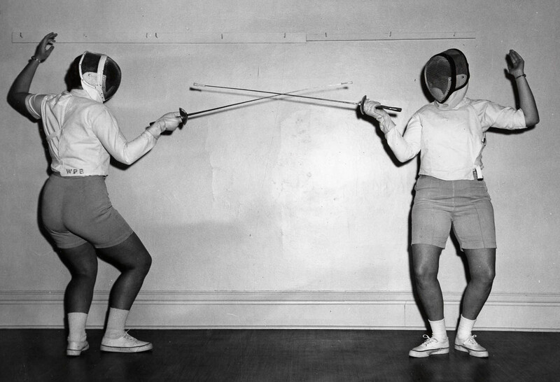 two women fencing