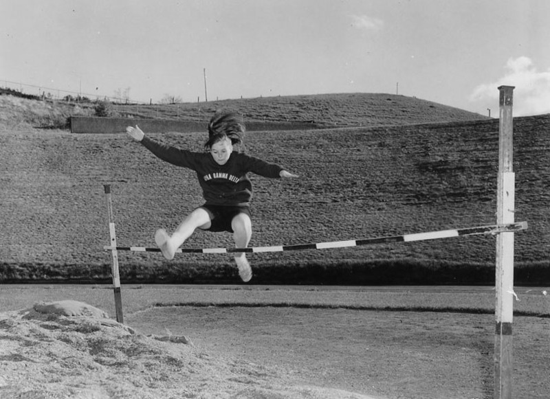woman doing high jump