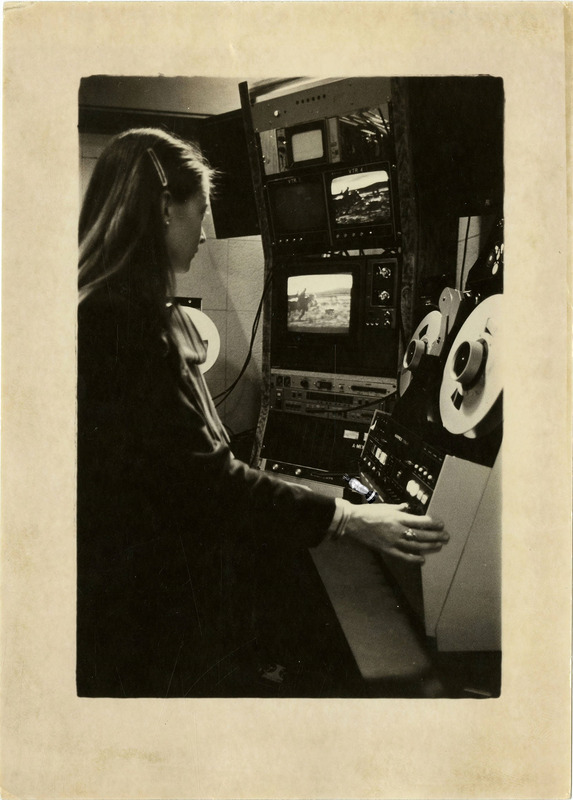 Photo of a woman working broadcast equipment, could it be channel [3]