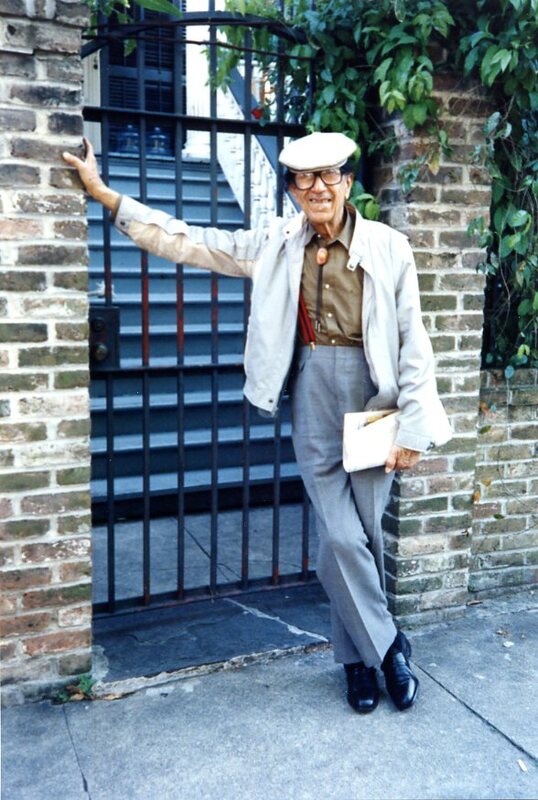 Doc Cheatham in front of a garden gate entrance, possibly to a house in New Orleans, Louisiana