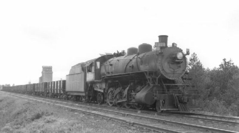 Northern Pacific Railroad locomotive no. 1521 with 684 in tow
