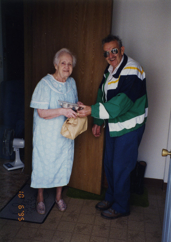 Frank Turpin delivering a meal to Eunice Lovell [2]