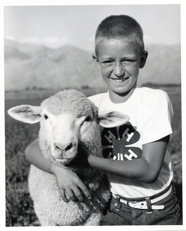 Robin Roy Pearson, 9, from Moore, Idaho, and his Columbia Lamb