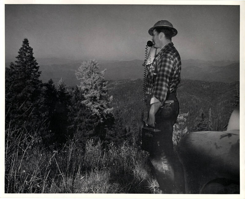 Bob Tondevold surveying the land and air, using transmitter to relay information