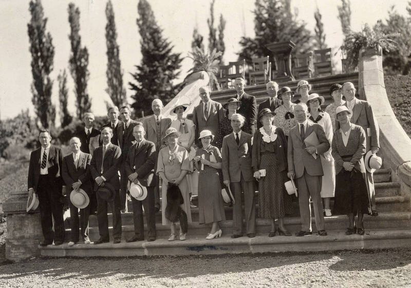 Memorial Steps, University of Idaho. Dedication. Moore is center holding her coat. Her husband is on her right.