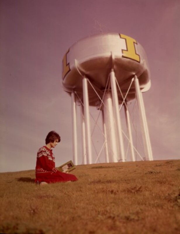 Student reading below the "I" tower