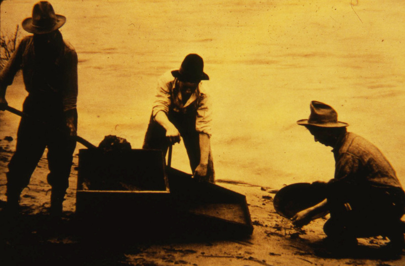 three men river mining