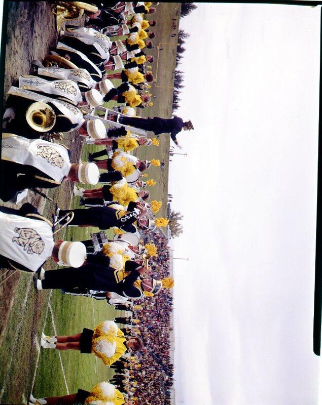marching band performing at football game