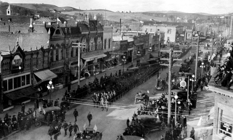 soldiers marching down Main Street in World War I parade